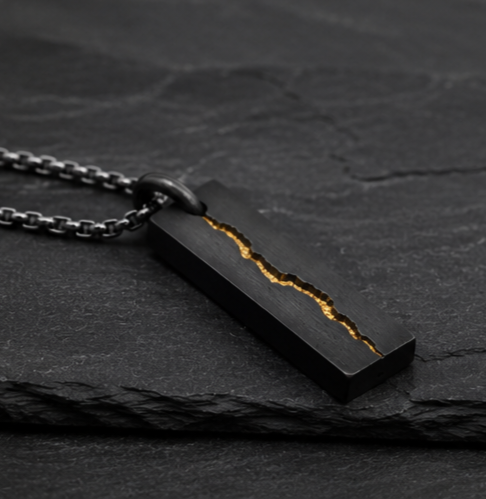 Rift Pendant
Handcrafted Oxidised Sterling Silver & 24K Gold Pendant