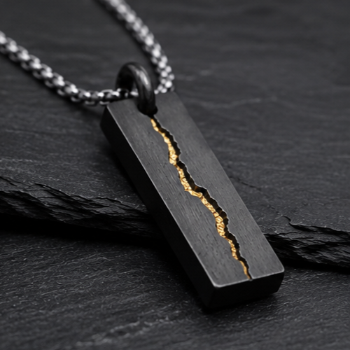Rift Pendant
Handcrafted Oxidised Sterling Silver & 24K Gold Pendant