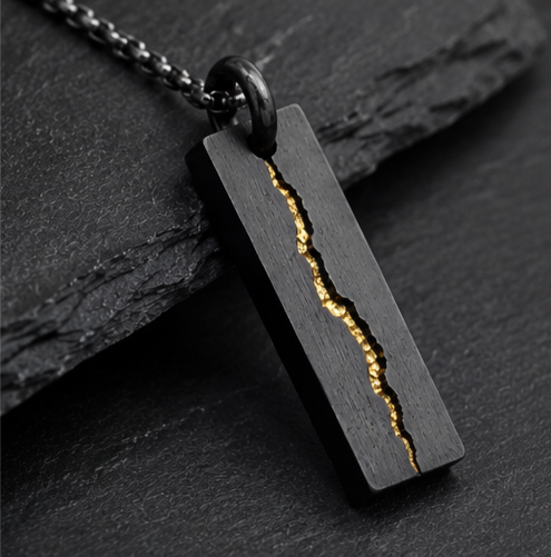 Rift Pendant
Handcrafted Oxidised Sterling Silver & 24K Gold Pendant