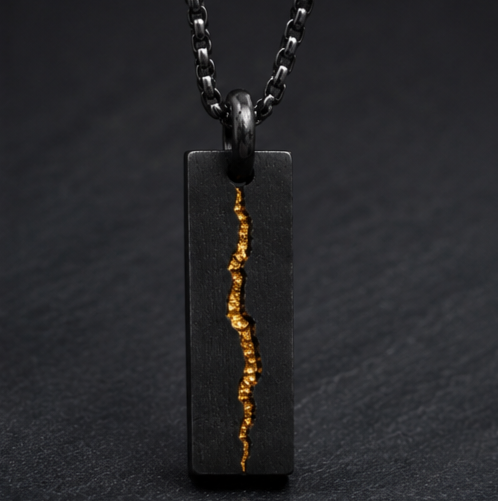 Rift Pendant
Handcrafted Oxidised Sterling Silver & 24K Gold Pendant